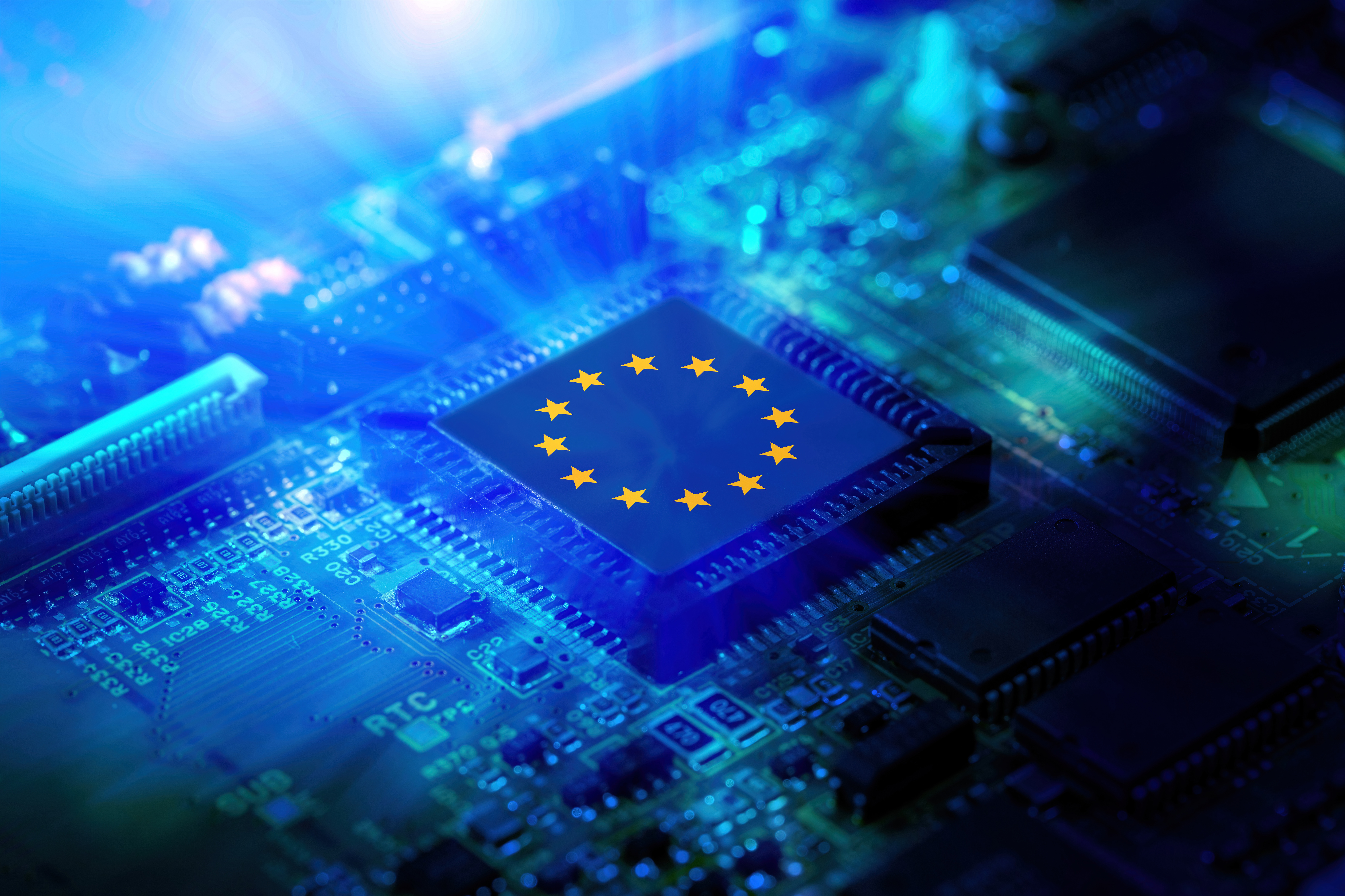 EU flag on a CPU processor. European chip manufacturer, GPU microchip on a motherboard